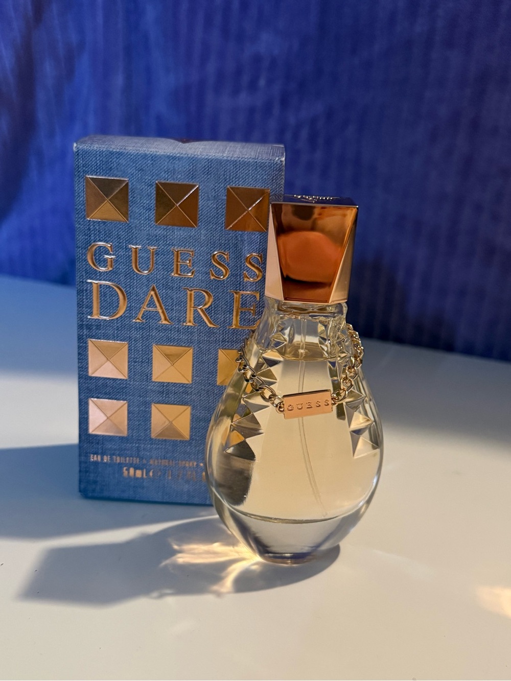 Free with purchase over $40 - guess perfume